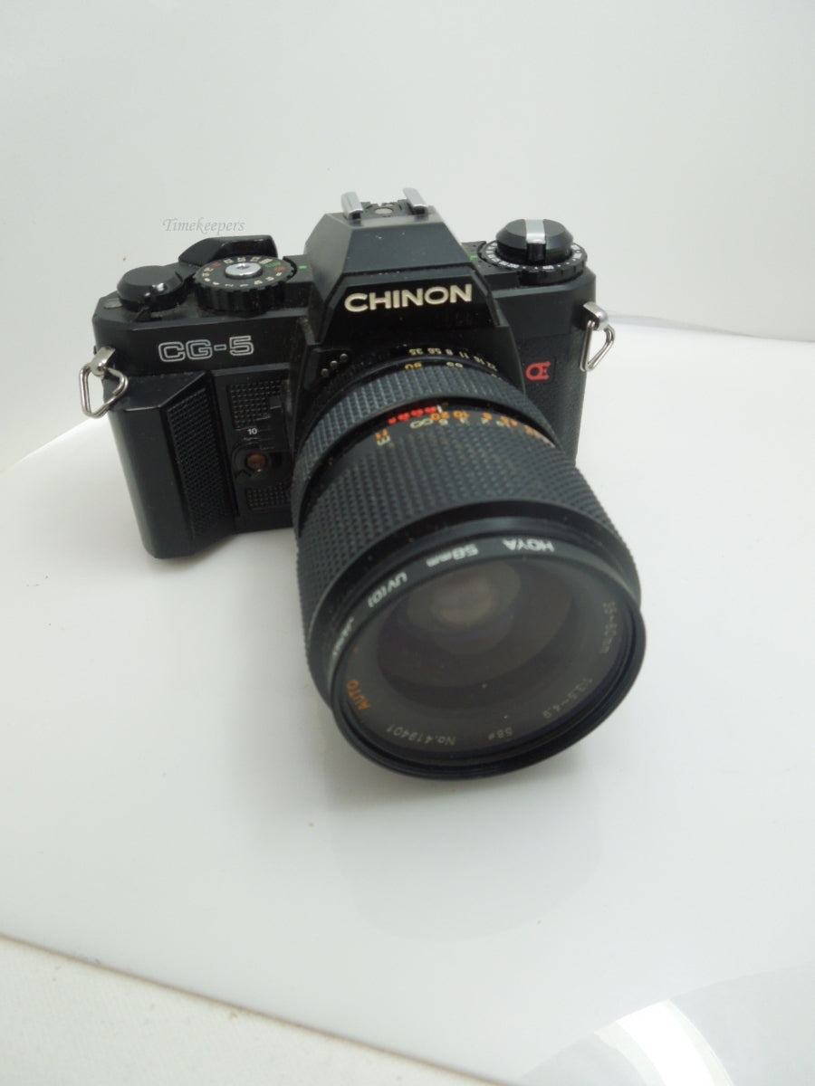 s592 Chinon CG-5 SLR with 35-80 mm Zoom Lens Model No. 419401