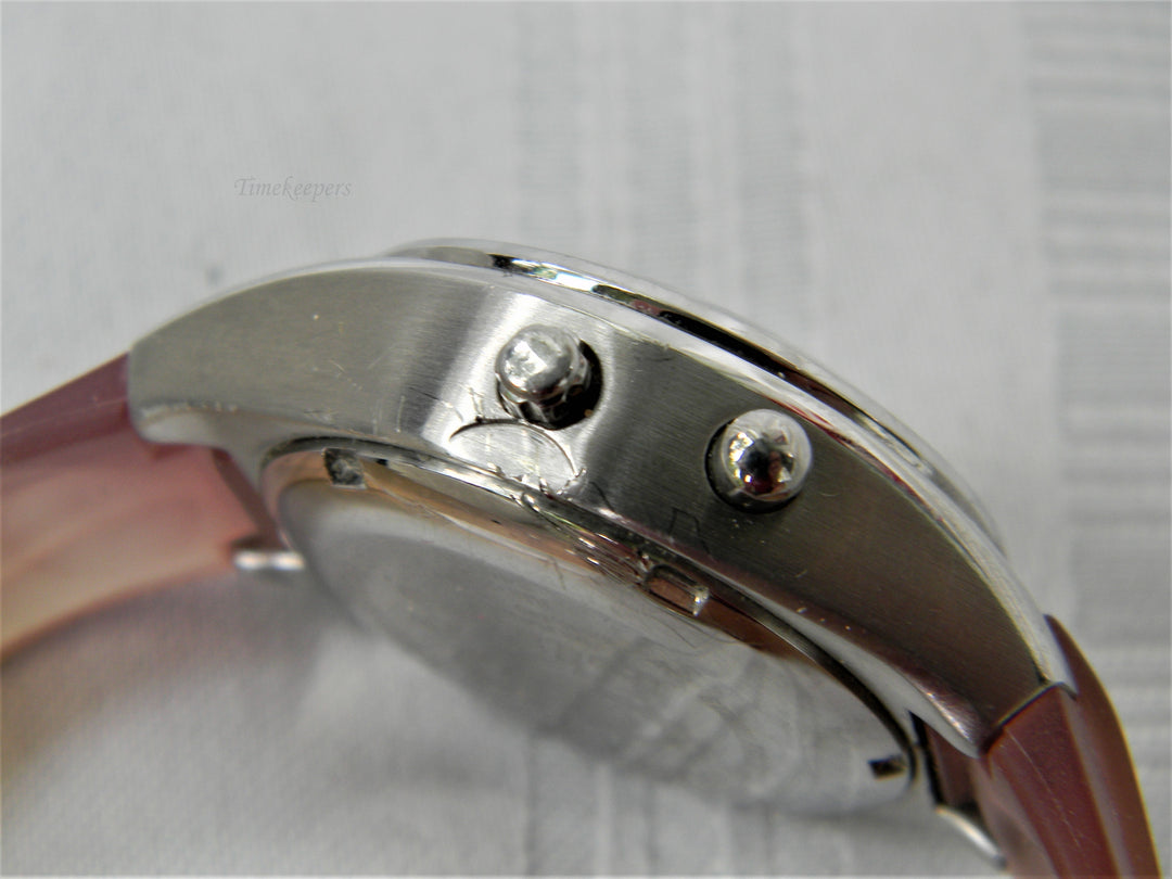 j428 Nice Women's Fossil Watch in Silver Tone and Silicone Band