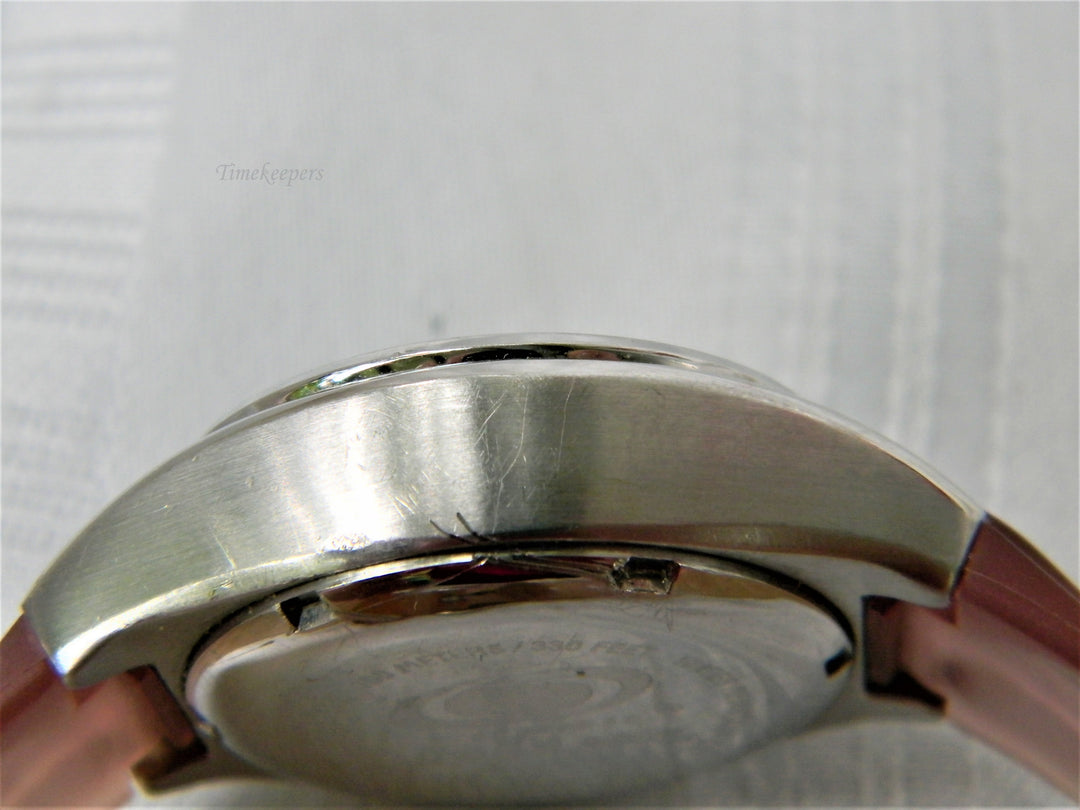 j428 Nice Women's Fossil Watch in Silver Tone and Silicone Band