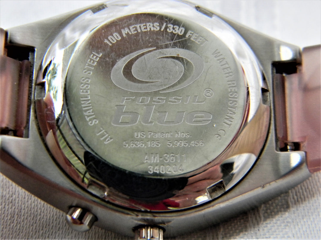 j428 Nice Women's Fossil Watch in Silver Tone and Silicone Band