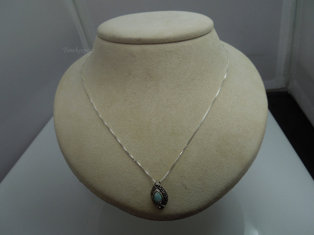 q109 Ladies Sterling Silver Chain 18.5" with an Opal and Marcasite Pendant