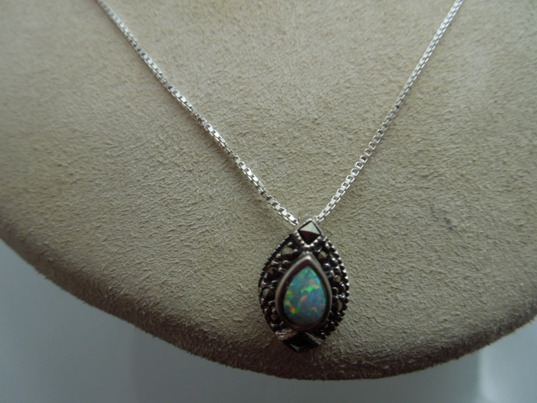 q109 Ladies Sterling Silver Chain 18.5" with an Opal and Marcasite Pendant