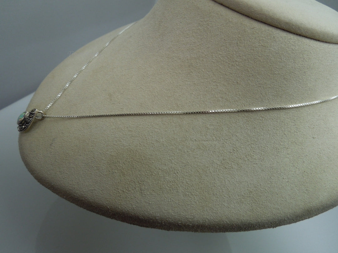 q109 Ladies Sterling Silver Chain 18.5" with an Opal and Marcasite Pendant