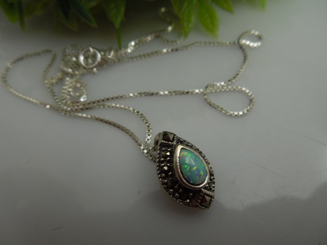 q109 Ladies Sterling Silver Chain 18.5" with an Opal and Marcasite Pendant