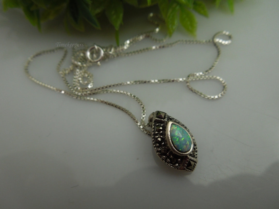 q109 Ladies Sterling Silver Chain 18.5" with an Opal and Marcasite Pendant