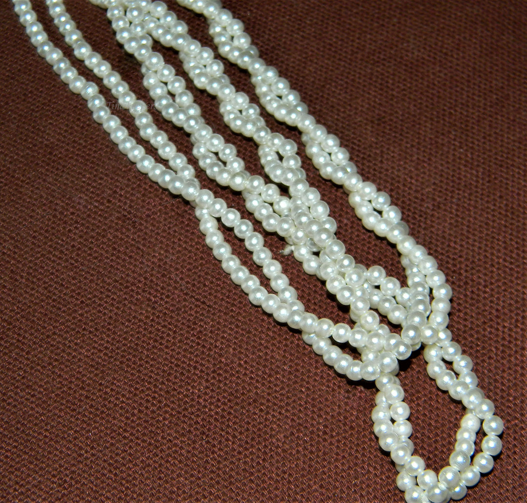 j523 Lovely Continuous Faux Pearl Twisted Double Strand Necklace