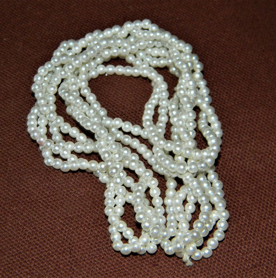 j523 Lovely Continuous Faux Pearl Twisted Double Strand Necklace