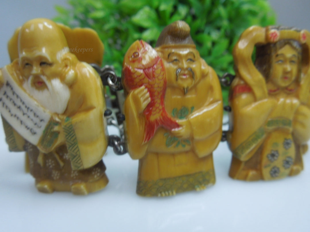 q217 Vintage Japanese Silver Carved Seven Lucky Gods Bracelet 9"