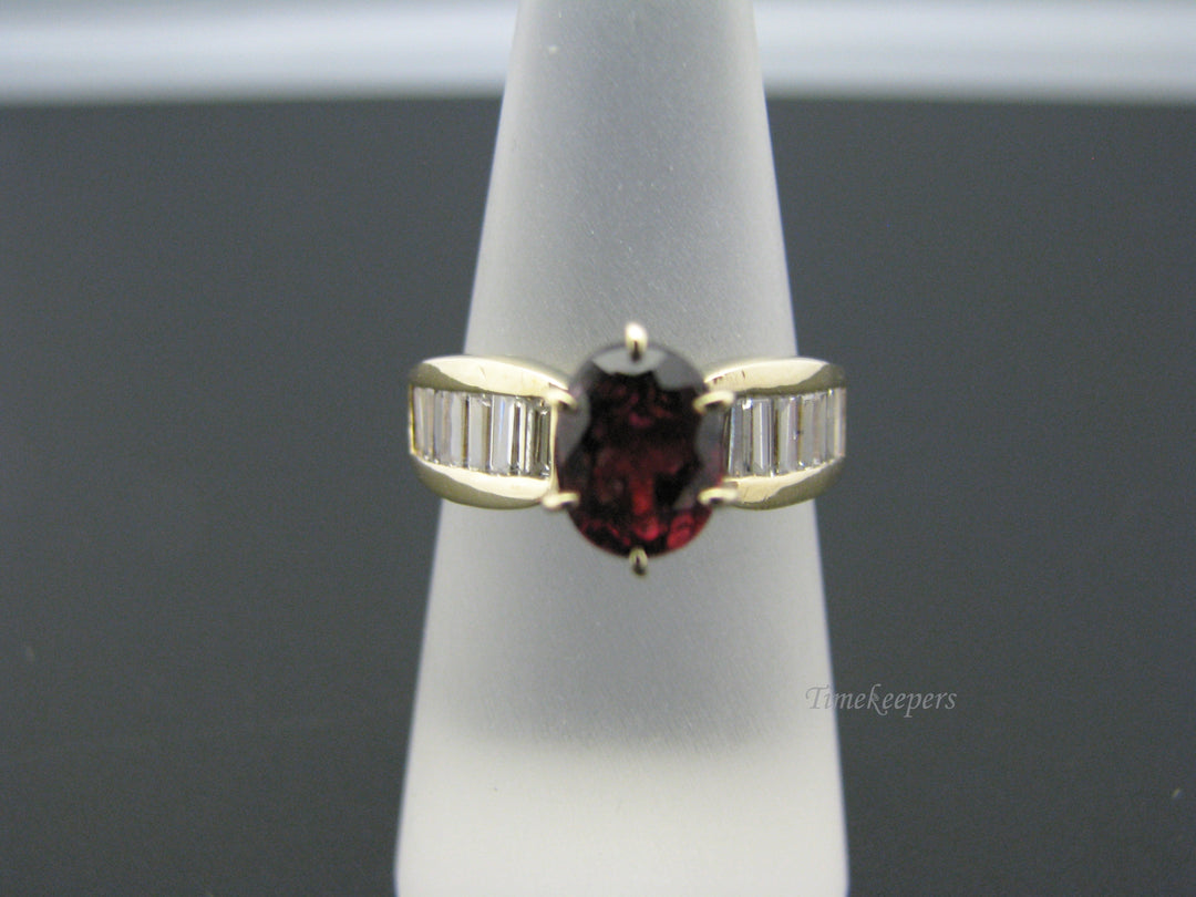 c810 Beautiful Ruby Ring in 14k Yellow Gold with CZ's down both sides