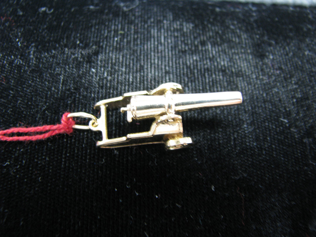 b242 Neat 14kt Cannon pendant