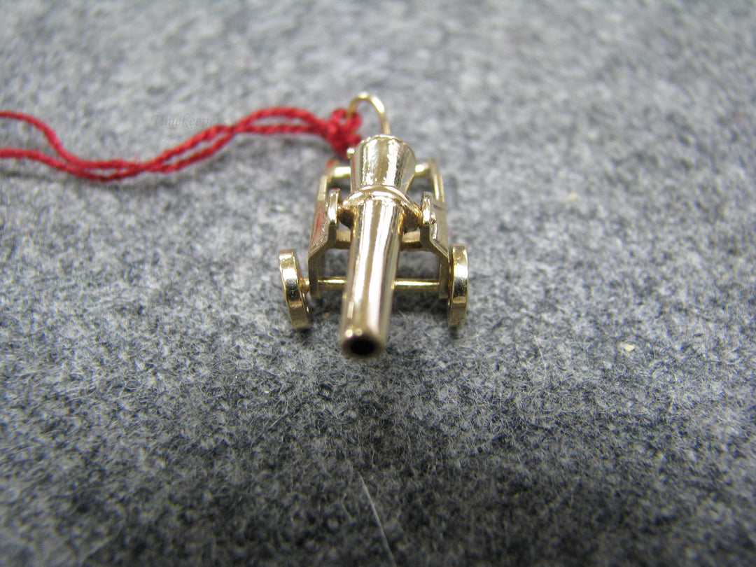 b242 Neat 14kt Cannon pendant