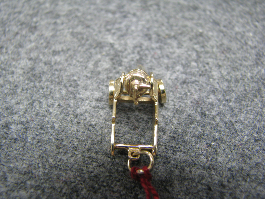 b242 Neat 14kt Cannon pendant