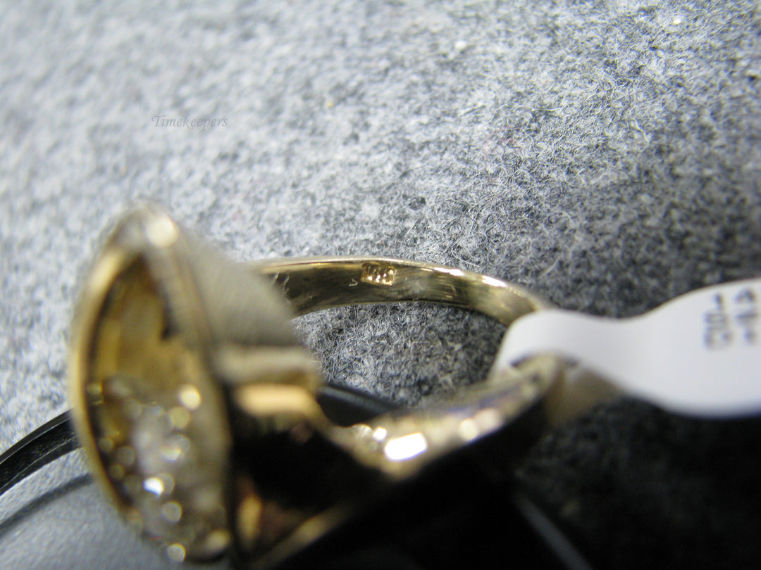 b243 Uniquely Shaped 14kt Diamond ring