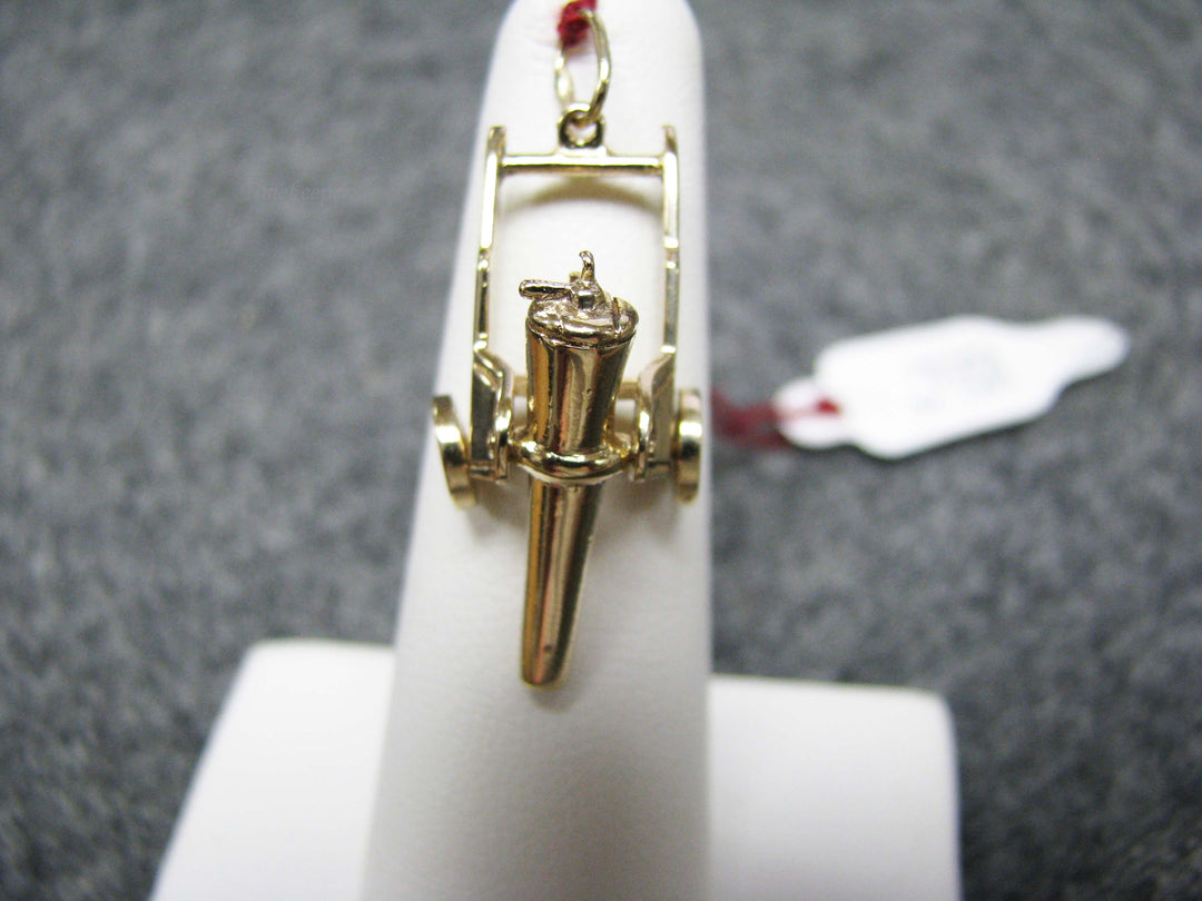 b242 Neat 14kt Cannon pendant