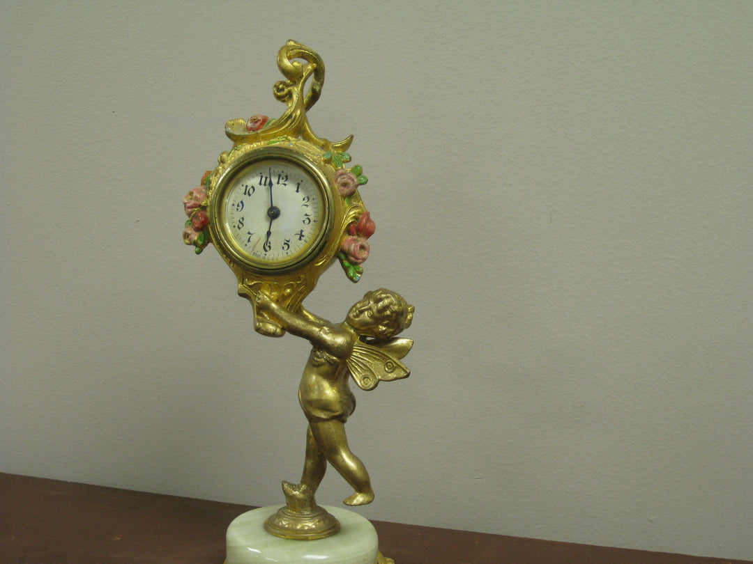 g224 1920s American Cupid Table Clock