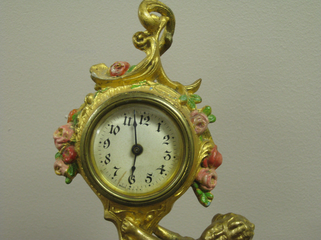 g224 1920s American Cupid Table Clock