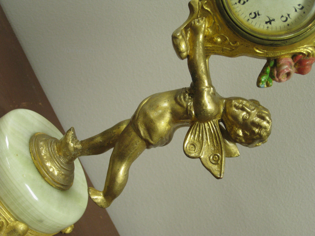 g224 1920s American Cupid Table Clock