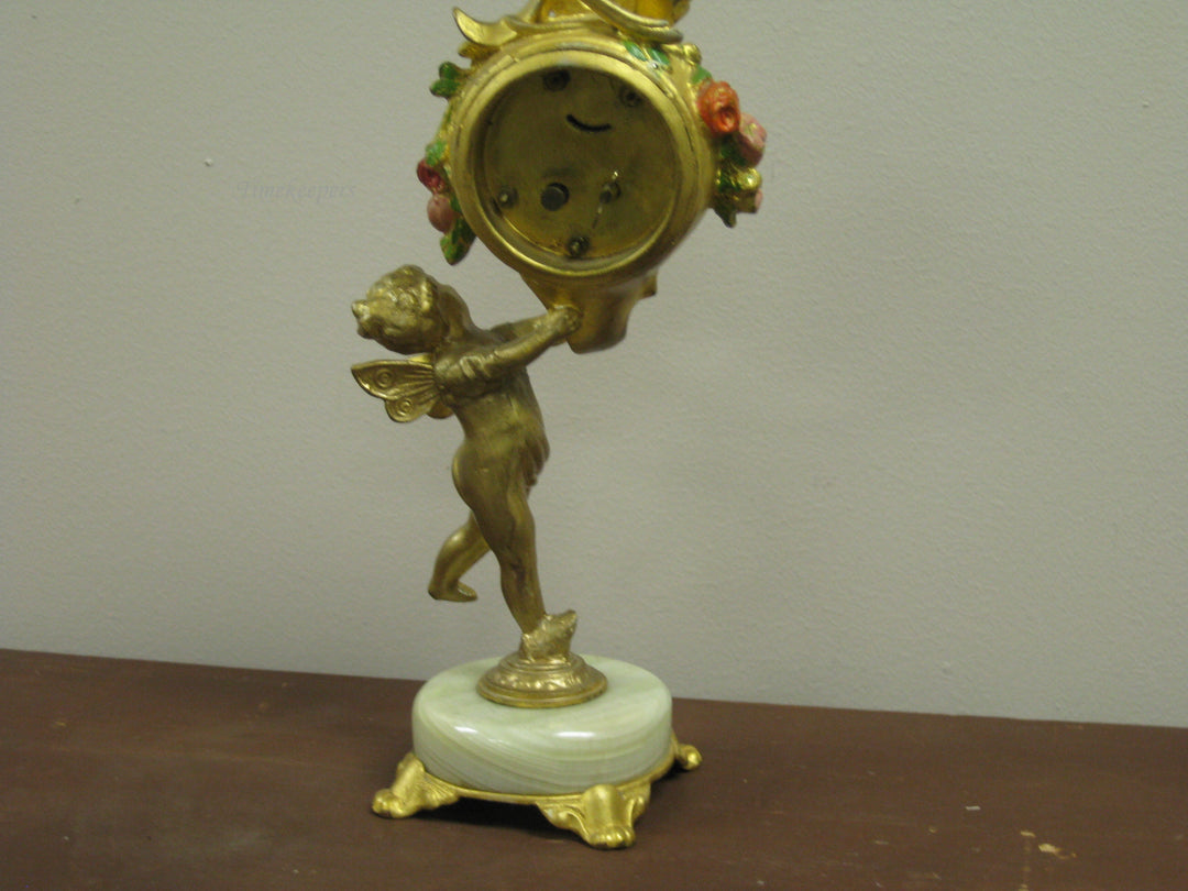 g224 1920s American Cupid Table Clock