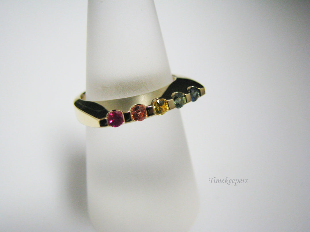 c966 Unique Channel Set Rainbow Sapphires Ring in 18k Yellow Gold