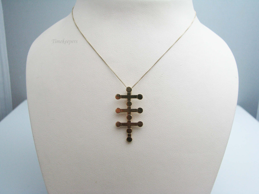 b402 Uniquely designed 14kt Yellow Gold Cross Pendant on a 10kt Yellow Gold chain