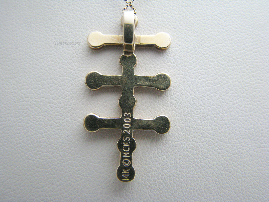 b402 Uniquely designed 14kt Yellow Gold Cross Pendant on a 10kt Yellow Gold chain