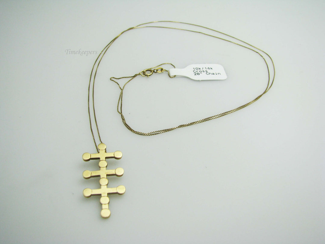 b402 Uniquely designed 14kt Yellow Gold Cross Pendant on a 10kt Yellow Gold chain