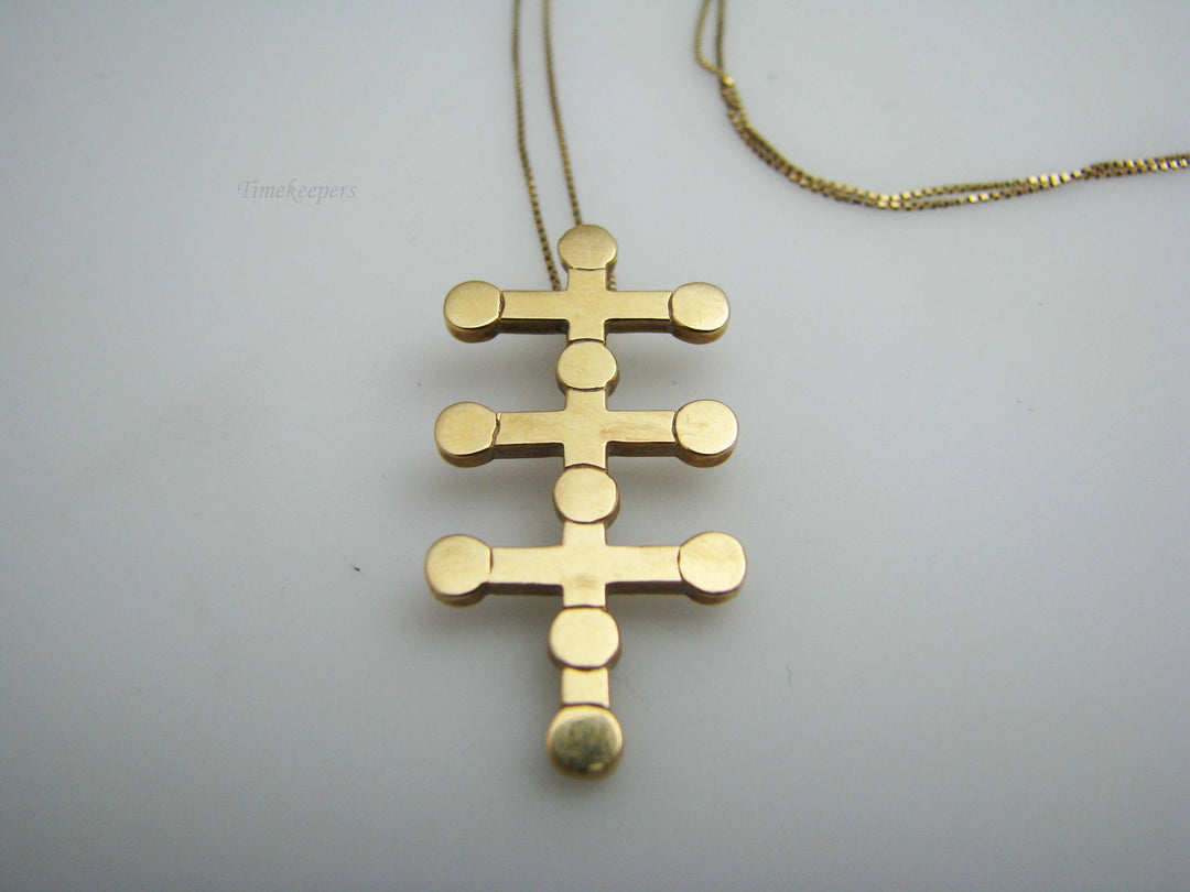 b402 Uniquely designed 14kt Yellow Gold Cross Pendant on a 10kt Yellow Gold chain