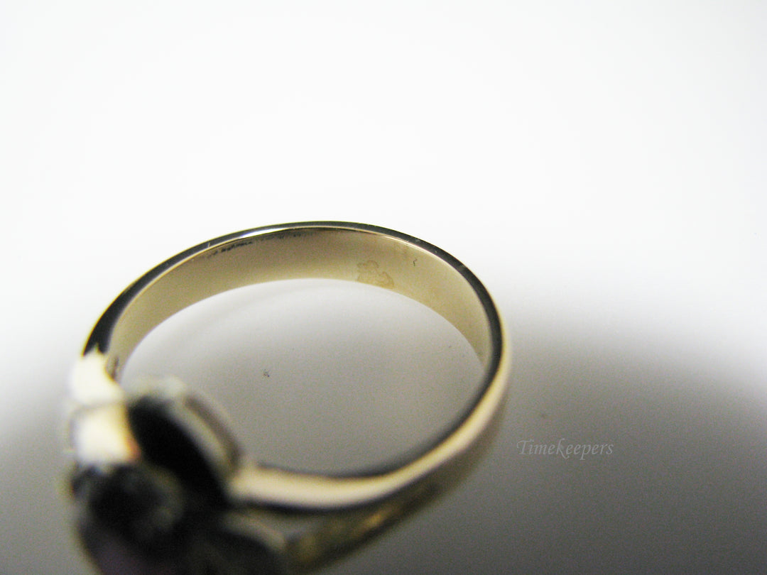 c978 Lovely Oval Purple Stone Ring With Diamonds in 14k Yellow Gold