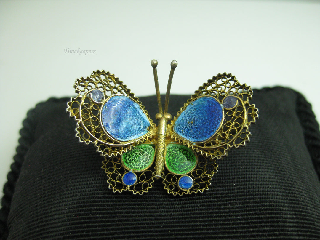 b671 Cute Antique Blue and Green Enamel Spun Filigree Butterfly Brooch