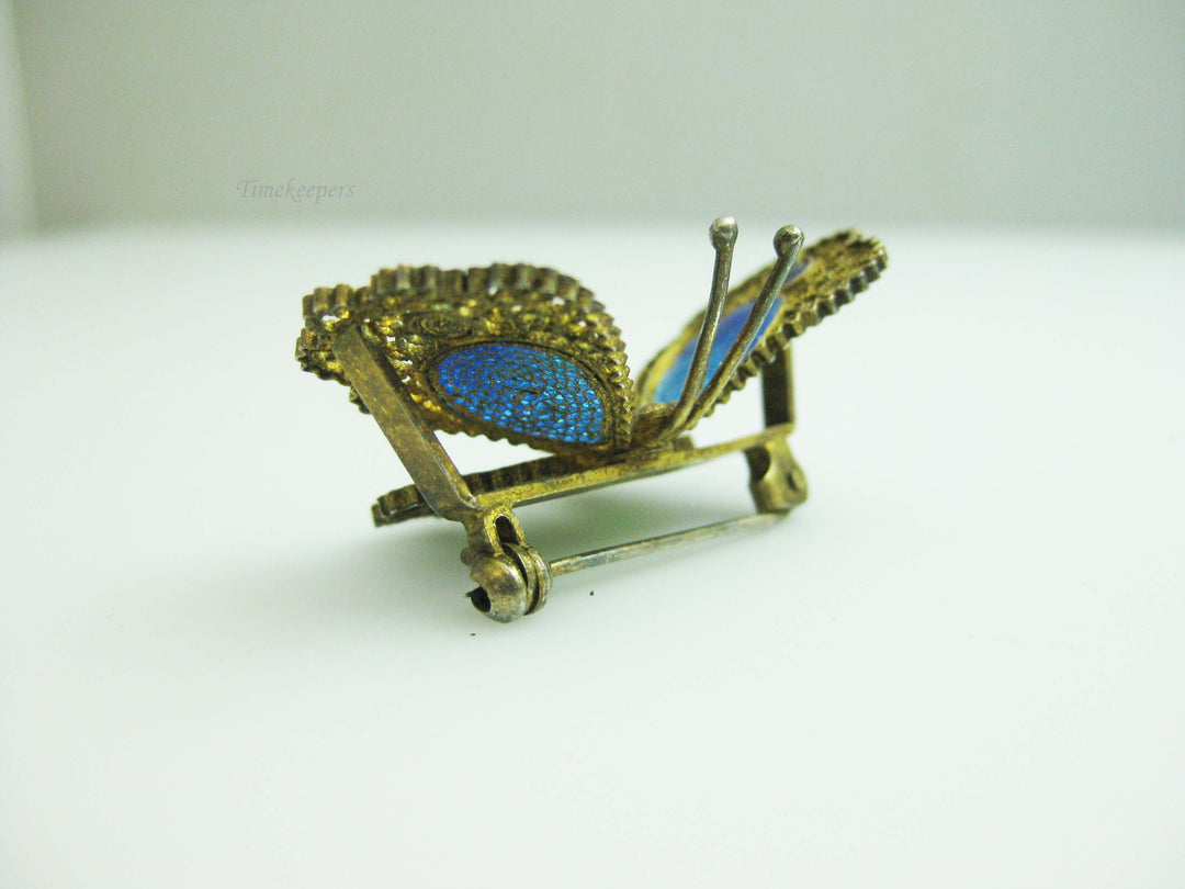 b671 Cute Antique Blue and Green Enamel Spun Filigree Butterfly Brooch