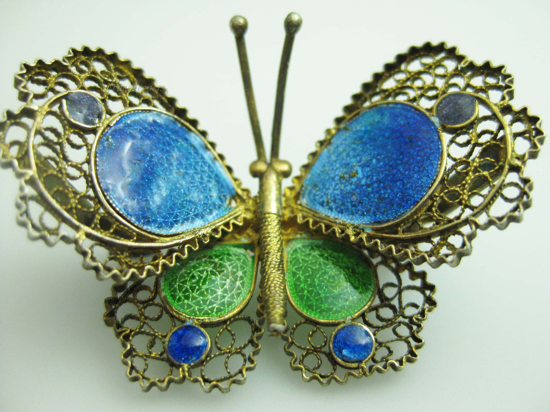 b671 Cute Antique Blue and Green Enamel Spun Filigree Butterfly Brooch