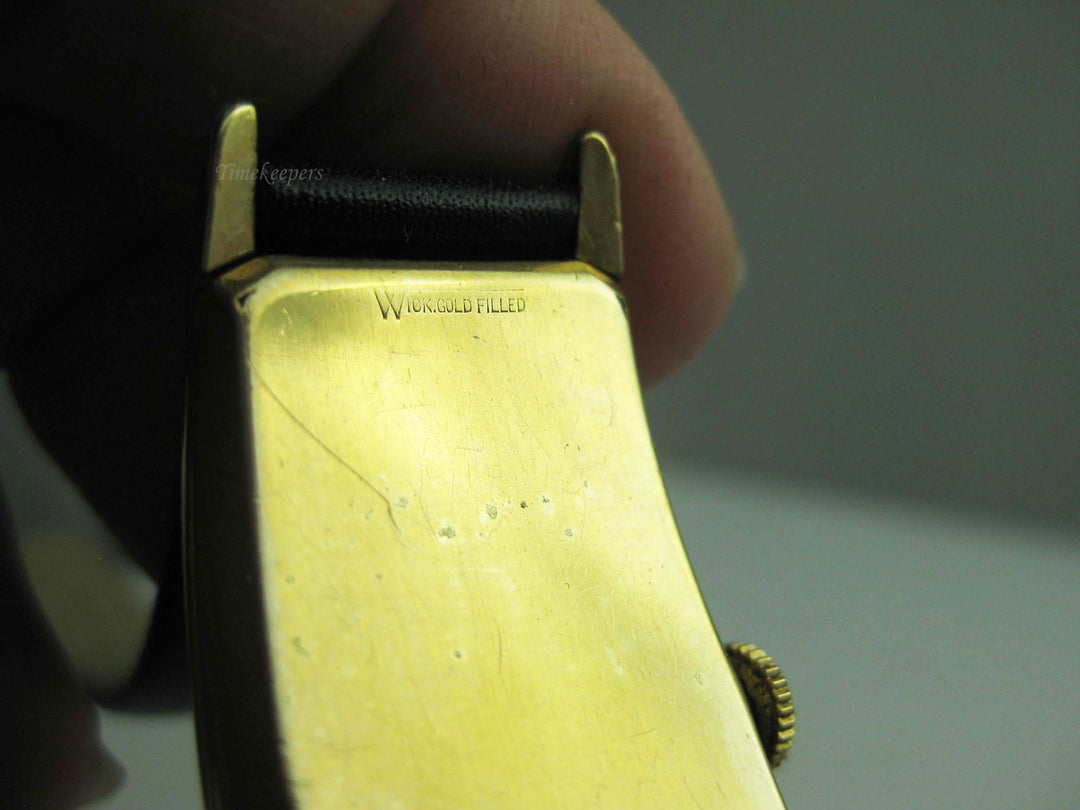 b702 Men's Vintage 10kt Gold Filled Waltham Curved Mechanical Wristwatch