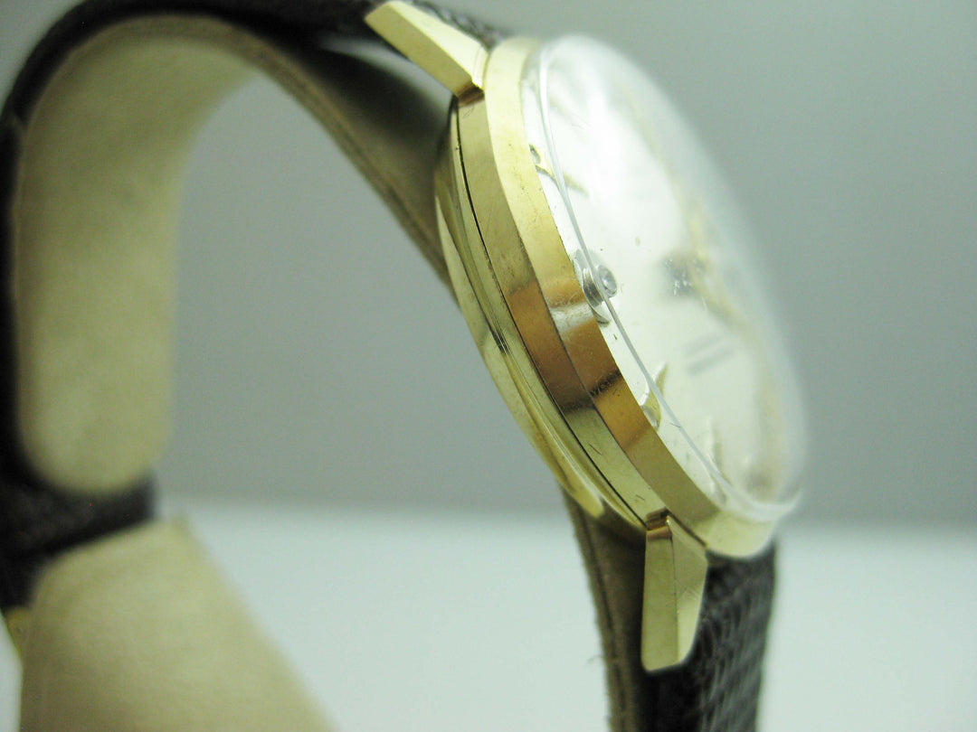 b714 Unisex 1970s 14kt Yellow Gold Welsbro 21 Jewel Shock Resistant Mechanical Wristwatch