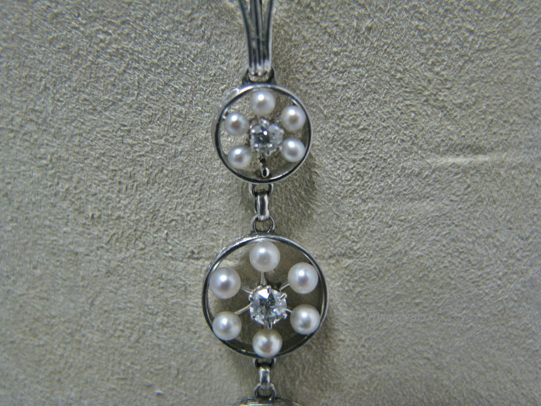 H135 Gorgeous Graduated Three Diamond Platinum Necklace with Seed Pearls