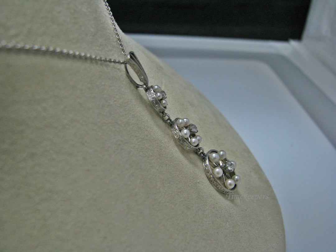 H135 Gorgeous Graduated Three Diamond Platinum Necklace with Seed Pearls
