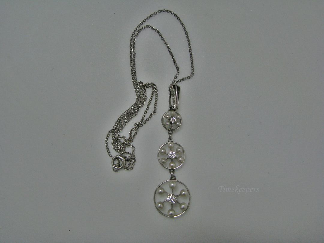 H135 Gorgeous Graduated Three Diamond Platinum Necklace with Seed Pearls