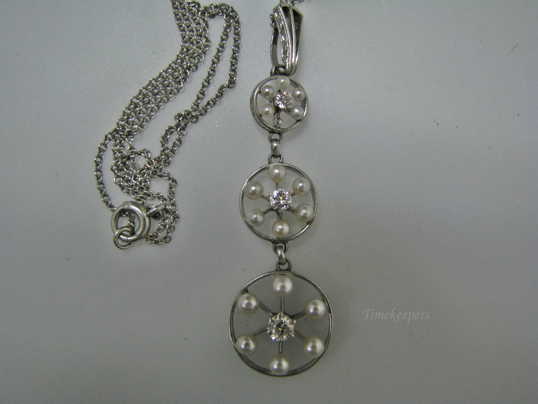 H135 Gorgeous Graduated Three Diamond Platinum Necklace with Seed Pearls