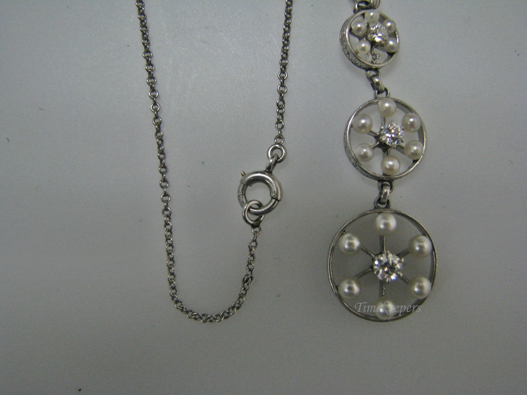 H135 Gorgeous Graduated Three Diamond Platinum Necklace with Seed Pearls