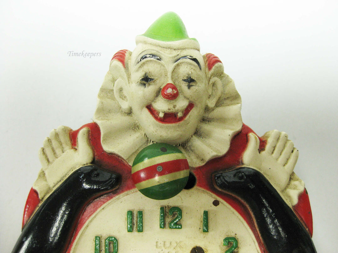b776 Vintage 1930s Lux Company Animated Clown and Seals Pendulette Wind Up Clock