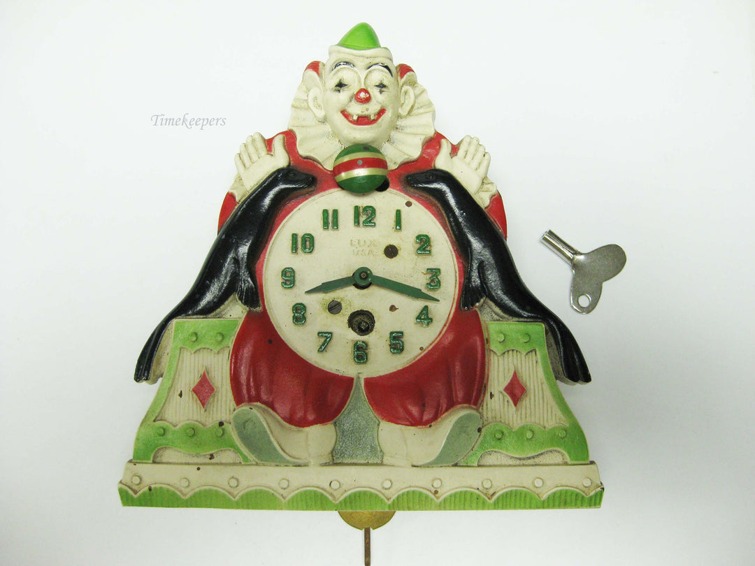 b776 Vintage 1930s Lux Company Animated Clown and Seals Pendulette Wind Up Clock