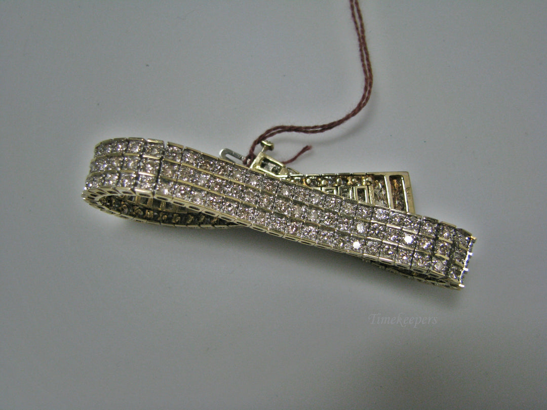 H183 Gorgeous Tennis Bracelet in 10k Yellow Gold with 7.0 TCW in Diamonds
