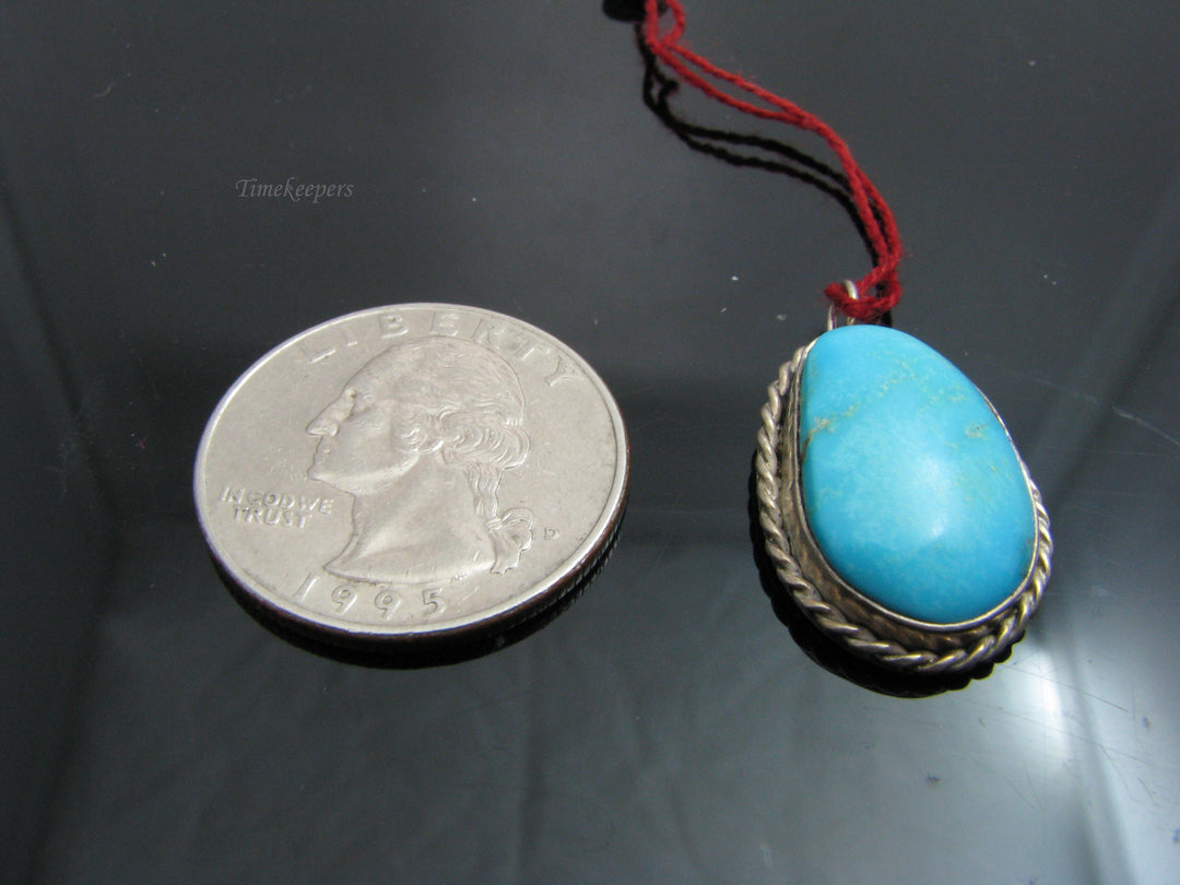 b830 Beautiful Sterling Silver and Oval Turquoise Pendant