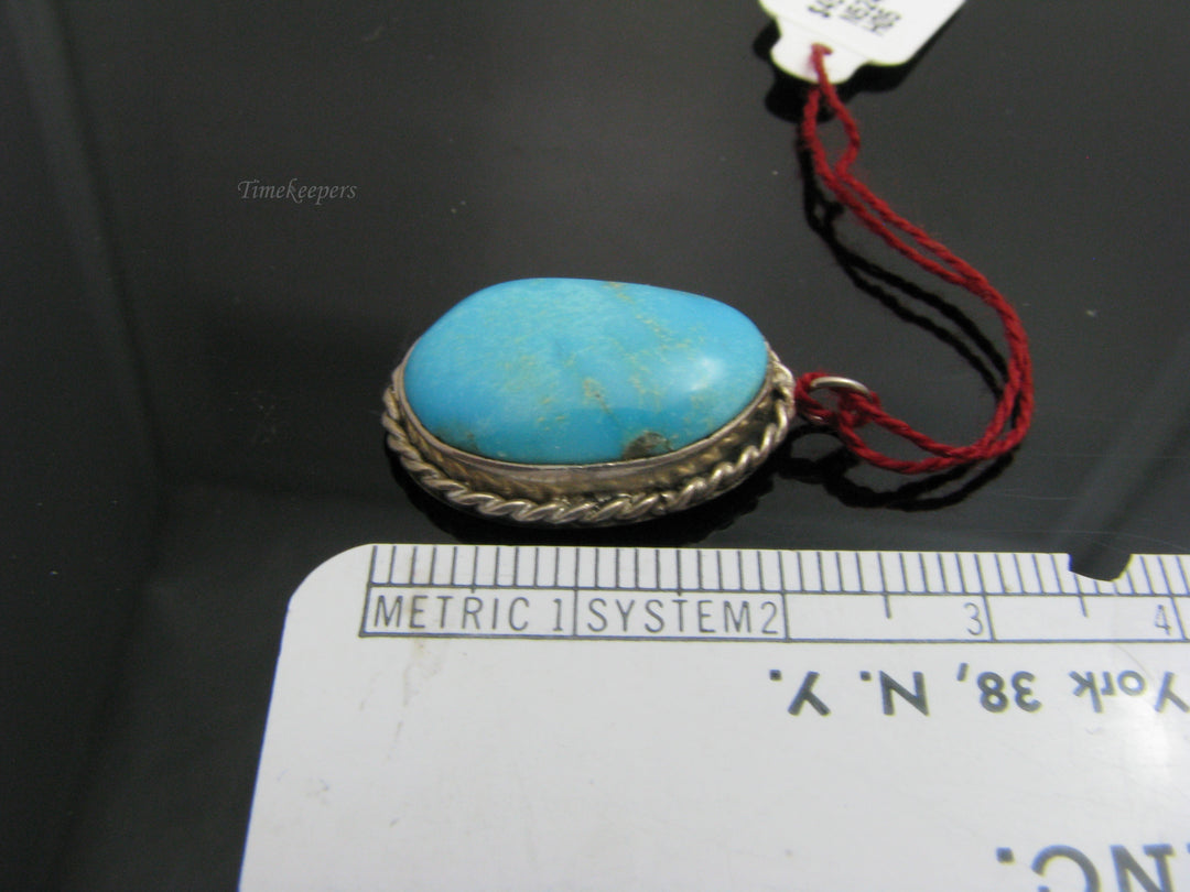 b830 Beautiful Sterling Silver and Oval Turquoise Pendant