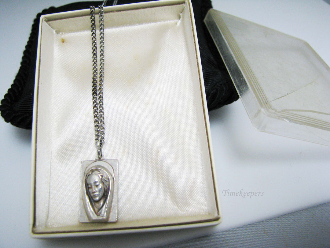 j109 Silver tone Madonna and Jesus Pendant in Original Box