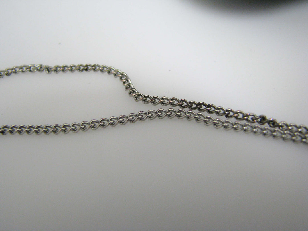 j109 Silver tone Madonna and Jesus Pendant in Original Box