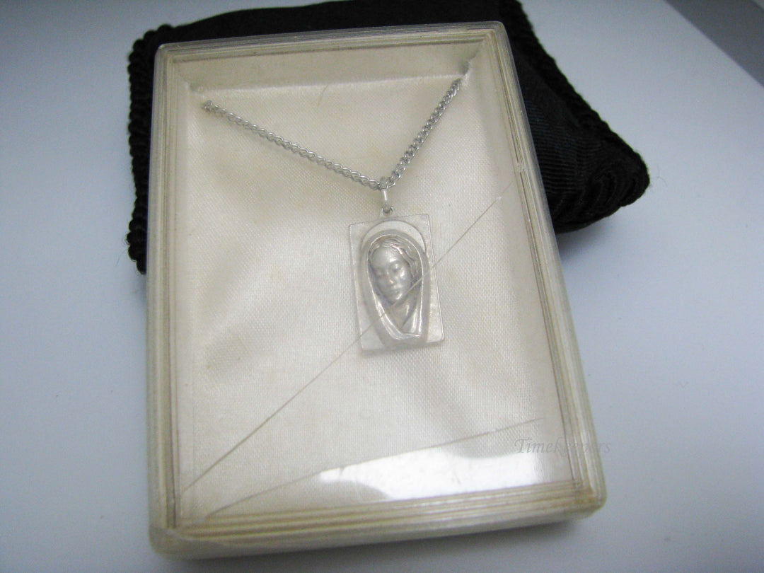 j109 Silver tone Madonna and Jesus Pendant in Original Box