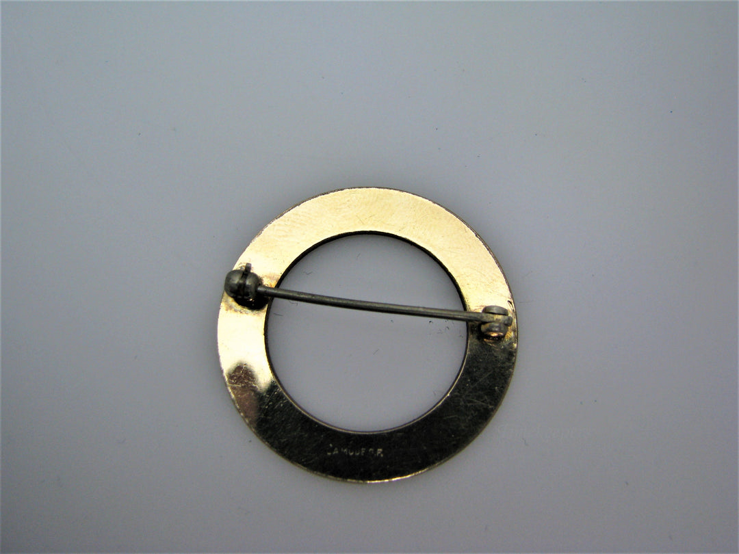j209 Pretty LaMode Gold Filled Circle Brooch embossed with a Design