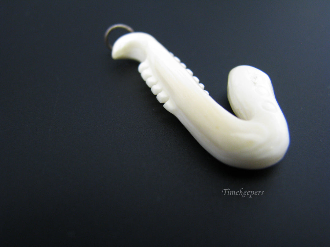 c673 Vintage Carved Bone Saxaphone Pendant/ Charm