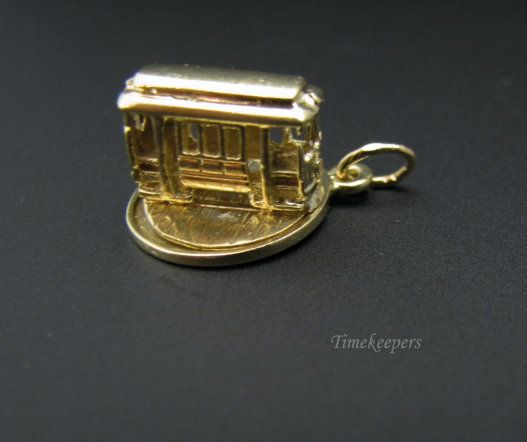 c725 (Moveable Charm) Trolley Car Spins Around in 14k Yellow Gold
