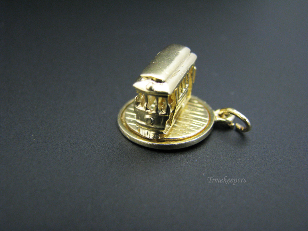 c725 (Moveable Charm) Trolley Car Spins Around in 14k Yellow Gold
